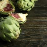 Concept of healthy food with artichoke, space for text