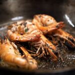 découvrez la recette authentique de la paella, un plat emblématique espagnol, riche en saveurs et en couleurs. apprenez à préparer ce délice à base de riz, de fruits de mer et de viande, et impressionnez vos invités avec une expérience culinaire mémorable.